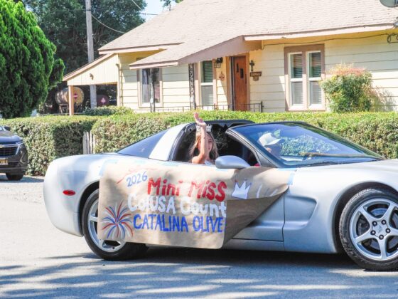 2026 Colusa County Mini Miss Catalina Oliveros waves to spectators as she rides through the Grimes 175th Anniversary and Fourth of July parade on July 4. Photo by Chris Pedigo.