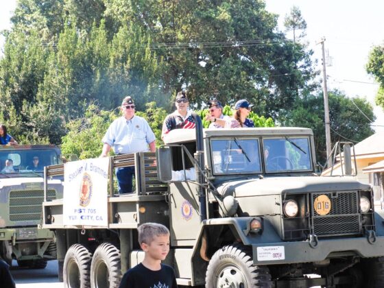 Members of American Legion Post 705 of Yuba City ride through the Grimes 175th Anniversary and Fourth of July parade on July 4. Photo by Chris Pedigo.