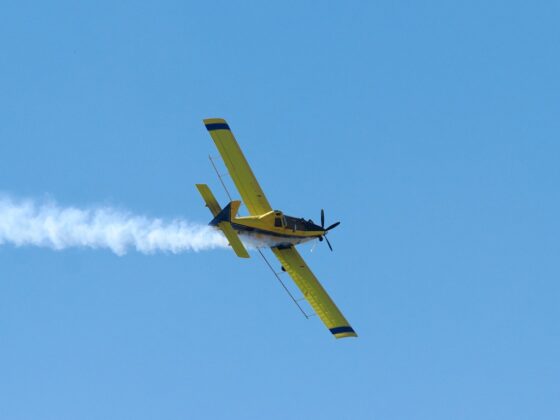 An agricultural aircraft performs a flyover during the Grimes 175th Anniversary and Fourth of July celebration on July 4. Photo by Chris Pedigo.