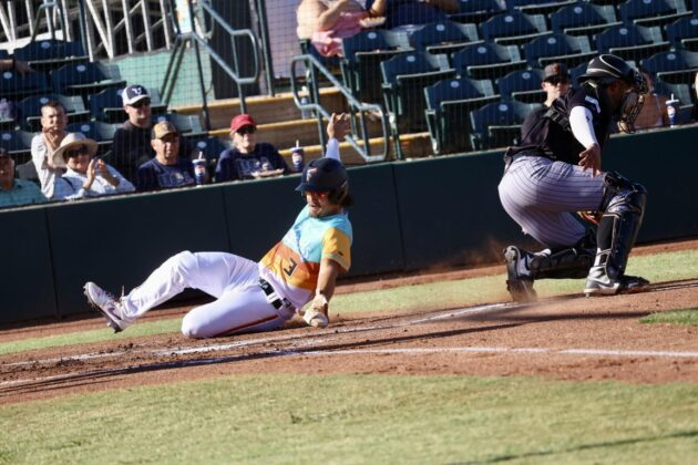 Yuba-Sutter infielder Zach Chamizo (3) slides home safely on Friday, July 3 in the Freebirds 17-12 win over Long Beach. Photo by Steven Bryla.